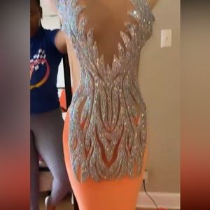 Small orange & silver prom dress